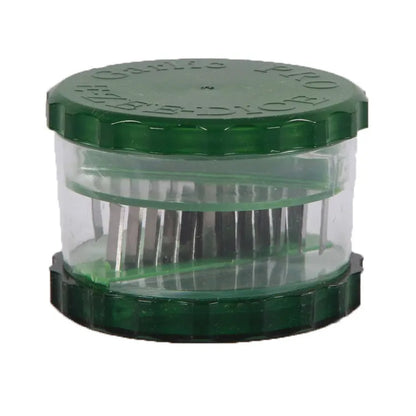 Green manual garlic peeler kitchen tool with silicone roller and plastic press handle.