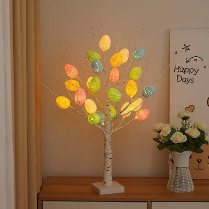 White birch-style LED Easter tree with warm white lights and cracked egg decorations on adjustable branches