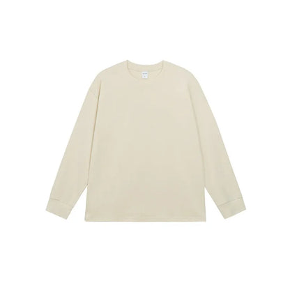 Man wearing a simple solid colour long sleeve cotton t-shirt in a loose, casual fit.