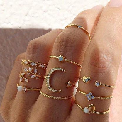 Enchanting gold-plated celestial-themed rings featuring stars, moons, and pearls