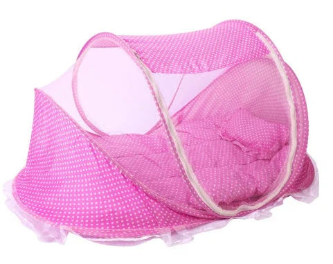 Portable foldable baby bed net with built-in mattress and pillows, perfect for travel and outdoor activities