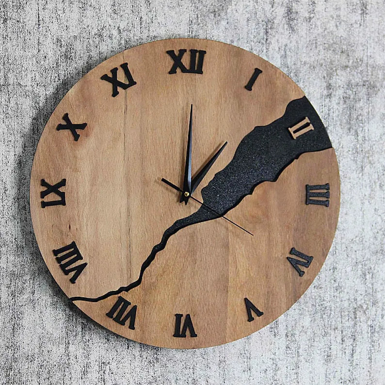 Modern wooden wall clock with crack finish surface in circular design showing time markers