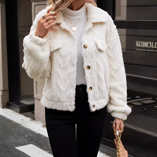 Ivory white women's double-sided plush button-front cardigan coat on a hanger.