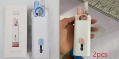 Multifunctional white cleaning pen kit open to show silicone tip, brush, keycap puller, and spray bottle for electronics.