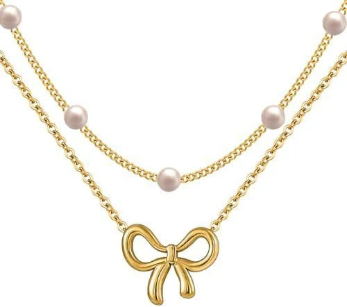 Double layer pearl choker with bow pendant in gold and silver options