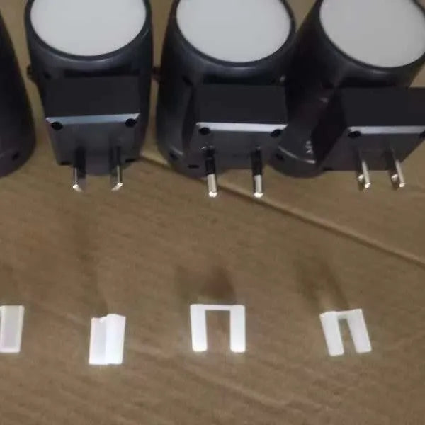 Direct plug-in bedside night lamp with adjustable brightness controls and rotating head in warm 3000K light colour