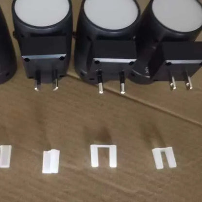 Direct plug-in bedside night lamp with adjustable brightness controls and rotating head in warm 3000K light colour