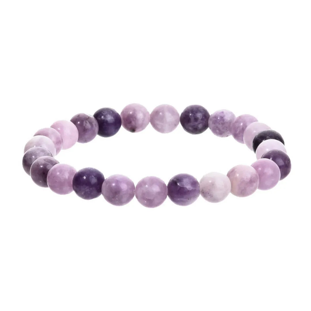 Purple geometric stone bead bracelet on an elastic band, showing manual craftsmanship.