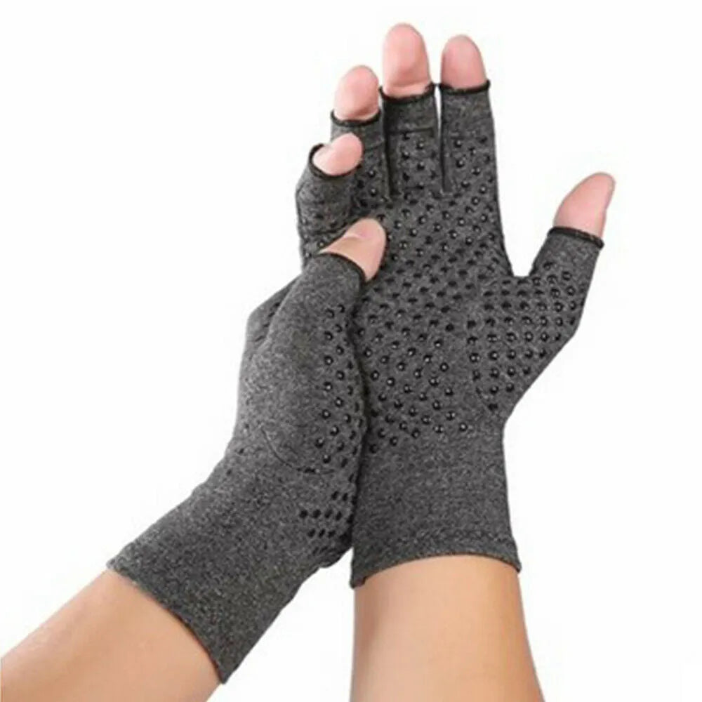 Grey half-finger joint compression gloves with silicone palm grips showing hand joint coverage