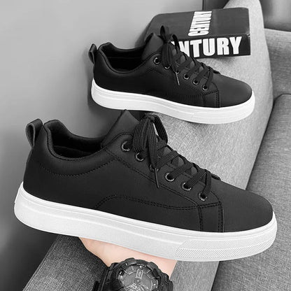 Men's low top casual sneakers in Korean style, shown in black, white, and two-tone colour options on a rubber sole.