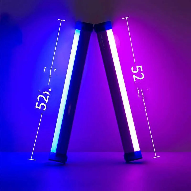 Blue rechargeable LED light tube with USB plug and push-button switch on a dark surface