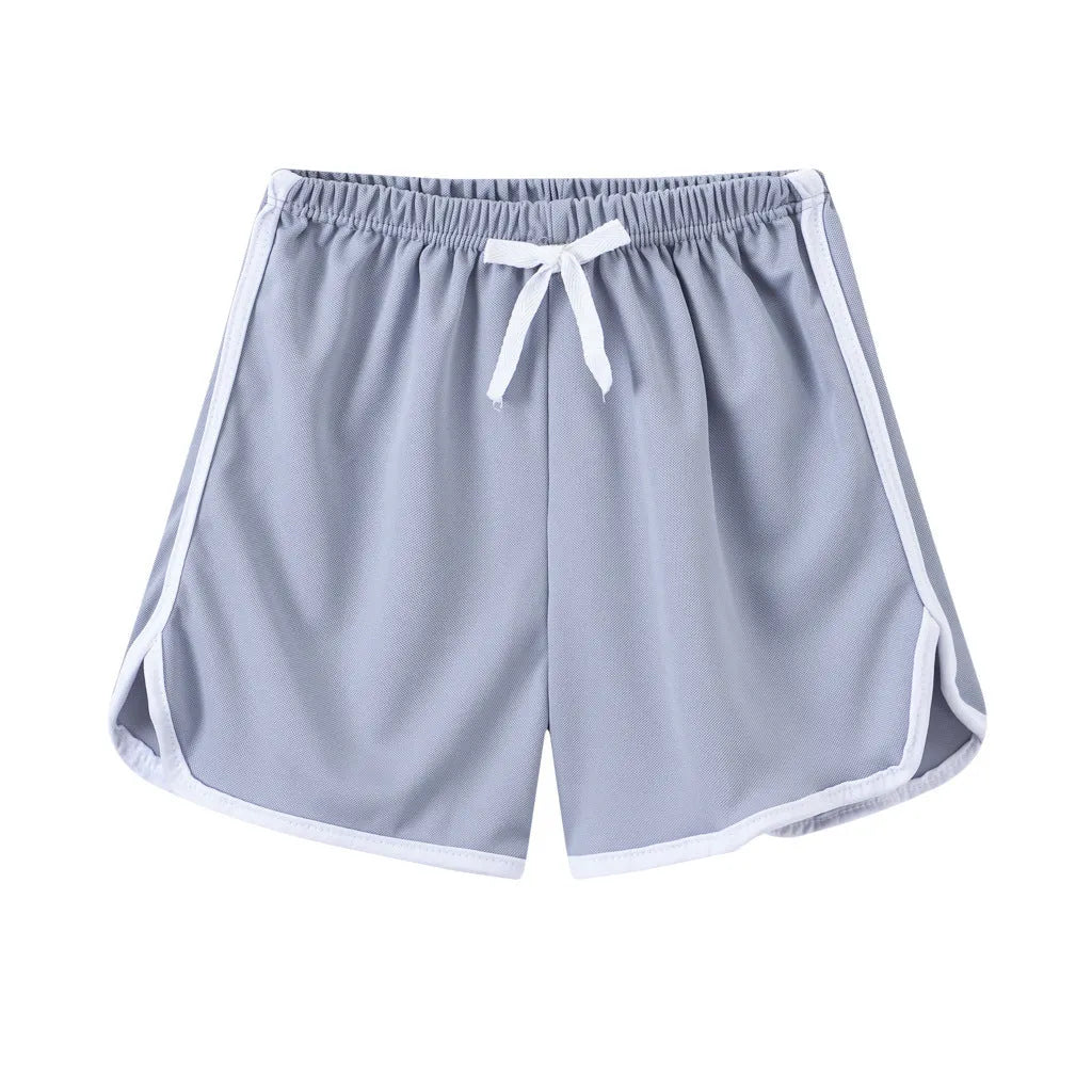 Children's polyester beach shorts in multiple colours and patterns, including leopard print and stripes, shown on size chart.