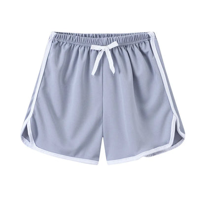 Children's polyester beach shorts in multiple colours and patterns, including leopard print and stripes, shown on size chart.