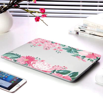 Plastic protective shell with floral pattern for Apple MacBook laptop showing sampling flower design
