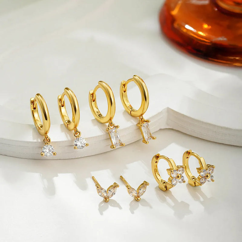 Copper electroplated zircon geometric square earrings for women, a four-piece set of geometric and star-shaped designs available in gold or silver plating with classic style for daily wear or events.