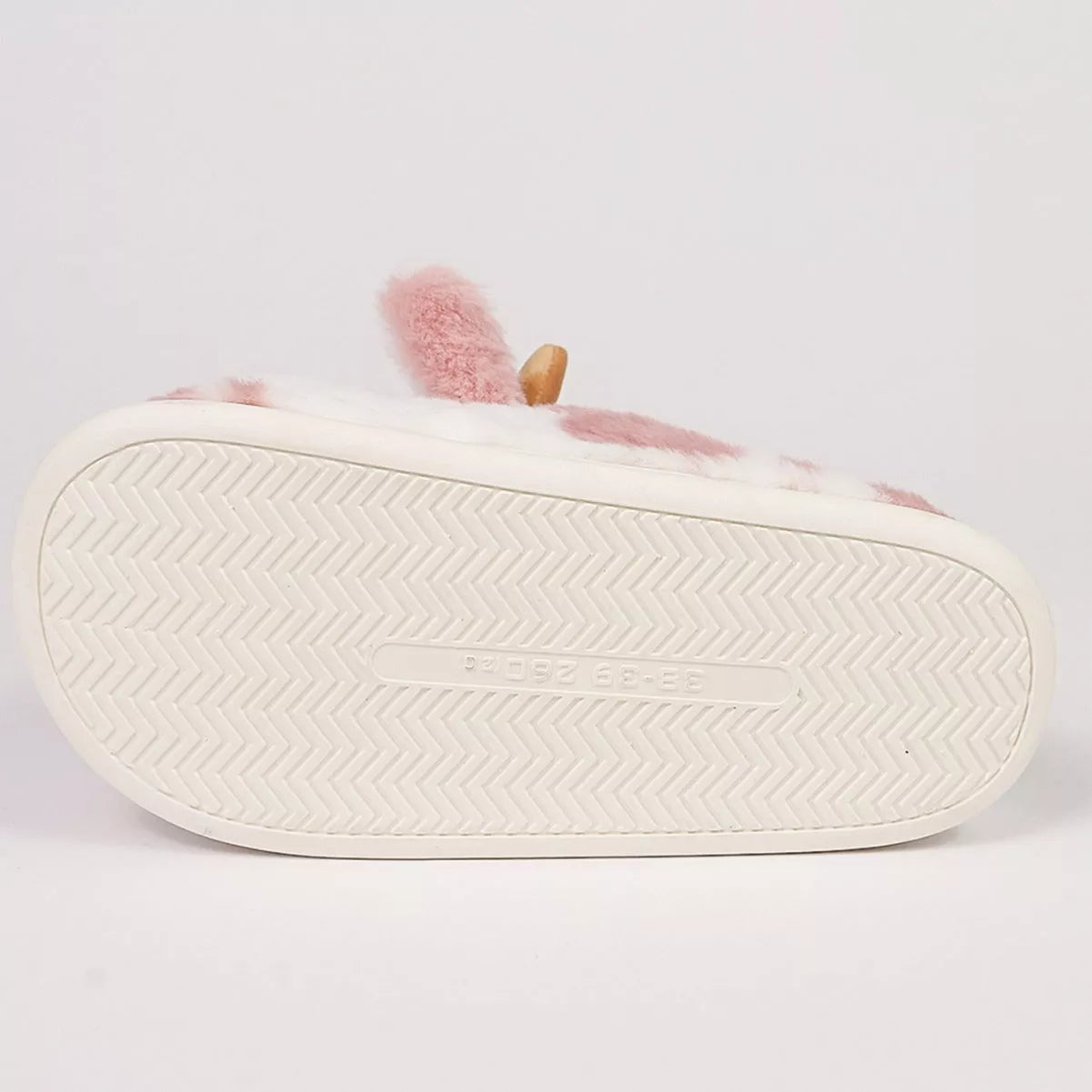 Cartoon cow plush slippers in black, leather red, and brown with non-slip soles