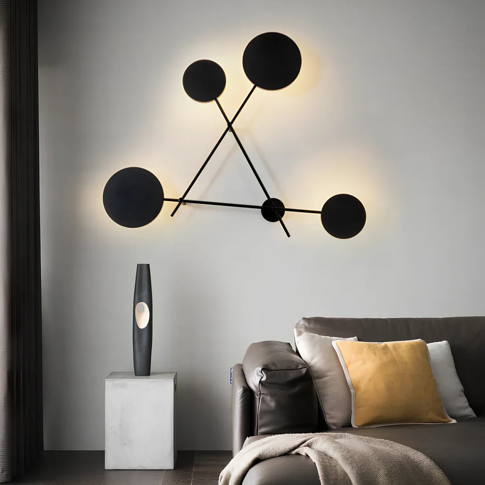 Triangular iron LED wall lamp with black finish and modern geometric design for home lighting