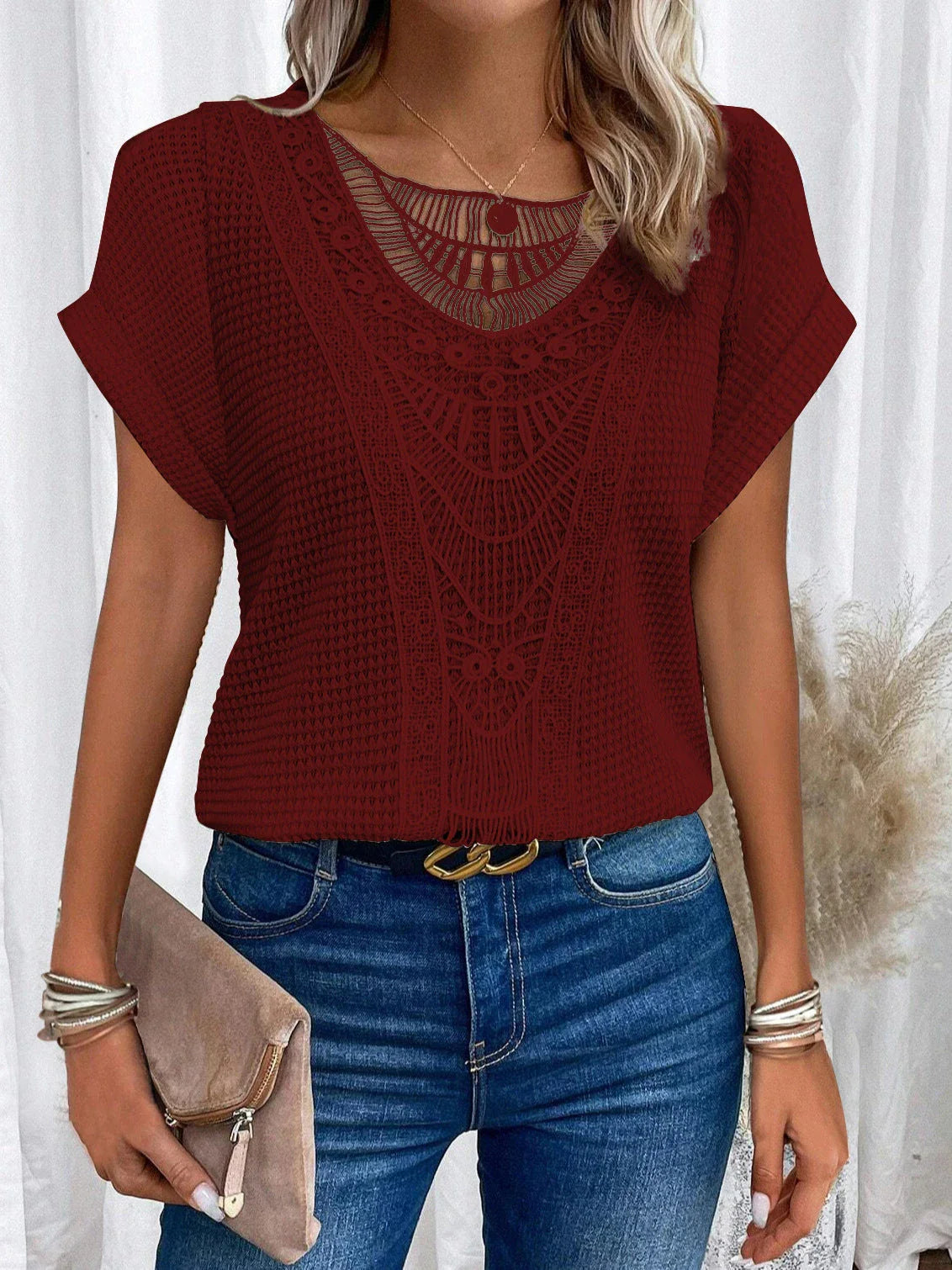 Women's short-sleeve tee in various colors, featuring a unique hollow-out design and soft, comfortable polyester fabric