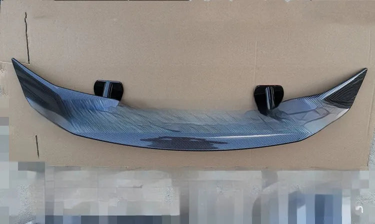 Car punch-free spoiler in ABS plastic showing adhesive mounting surface and finish options
