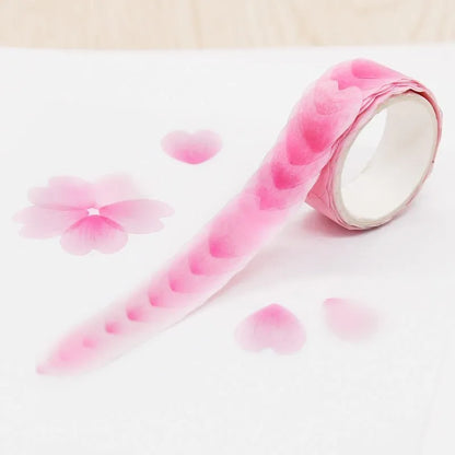 Roll of clover and paper decorative craft tape in blue, cherry blossom, mixed colour, and violet options.