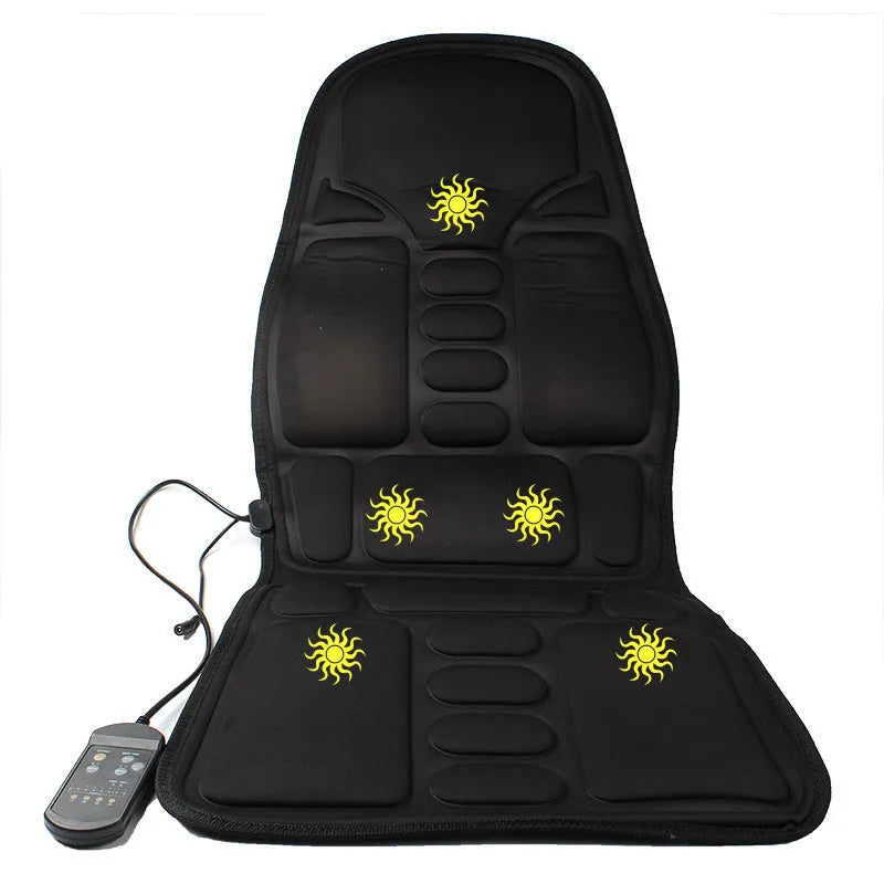 Black heating massage mat with infrared function and a seat cushion on a floor