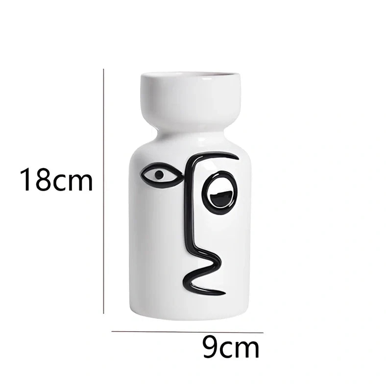 Ceramic vase with hand-painted surface in modern minimalist design, shown in large and small size variations