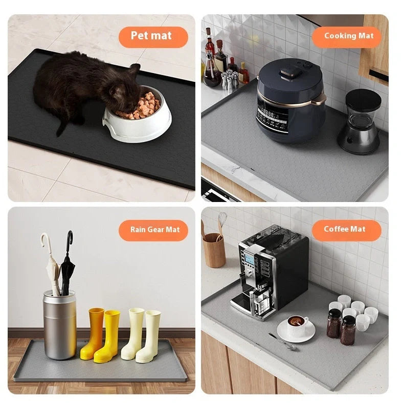 Grey silicone sink mat measuring 864mm by 558mm protecting kitchen cabinet from water damage