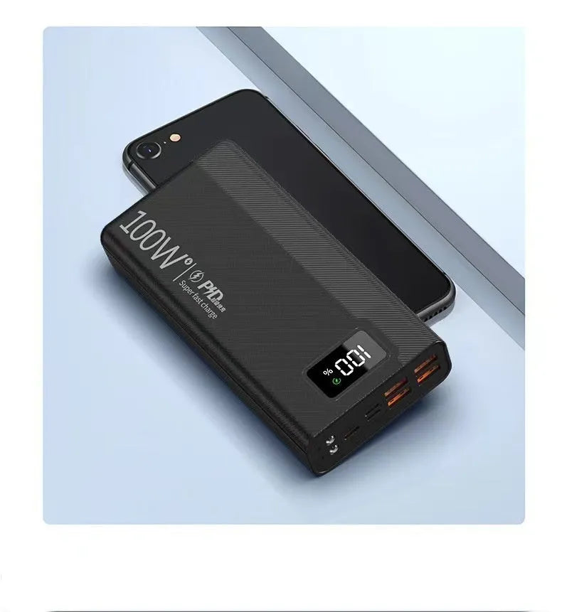 Black or white large capacity power bank showing its portable size and charging port.