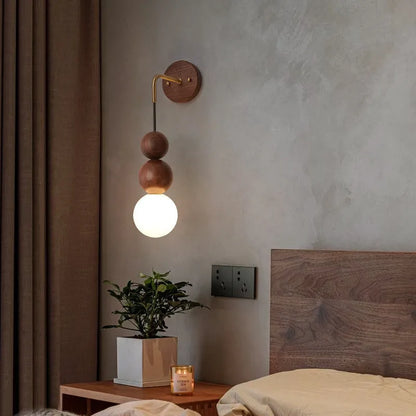 Cylindrical wood and copper wall lamp with tricolour light, 50cm tall.