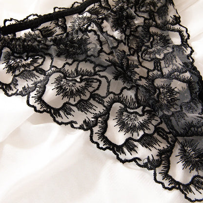 Black women's embroidered lace lingerie bikini with transparent sections and steel ring accents
