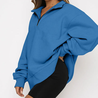 Women's zip turndown collar sweatshirt in various colors, showcasing loose fit and zipper detail.