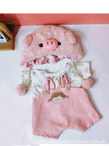 30cm doll clothing collection showing multiple outfit pieces including hooded jackets, sweaters, and suspender pants