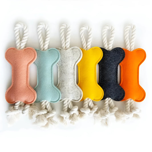 Durable felt bone shaped dog toy with rope knots, in blue colour, for chewing and puzzle play.