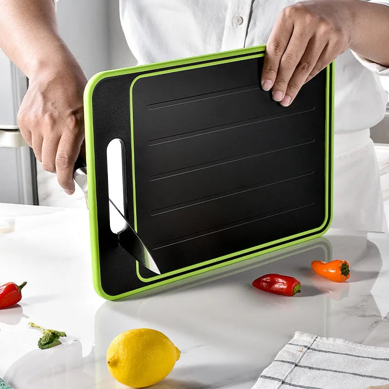 Grey square aluminium cutting board with double-sided design showing grinding teeth and knife sharpener