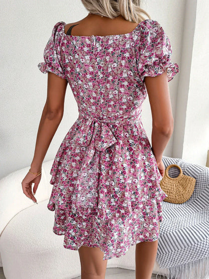 Elegant floral mini dress with A-line silhouette and short sleeves in a variety of vibrant colors