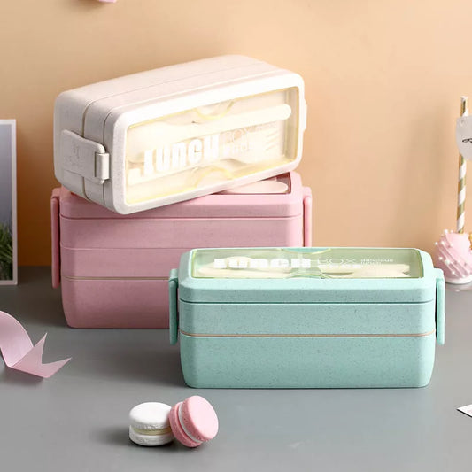 Wheat straw double-layer insulated lunch box in pink, green, and beige
