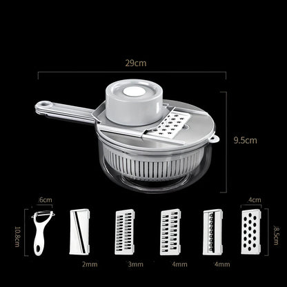 Grey and green vegetable slicer with five stainless steel blades and protective gauntlet