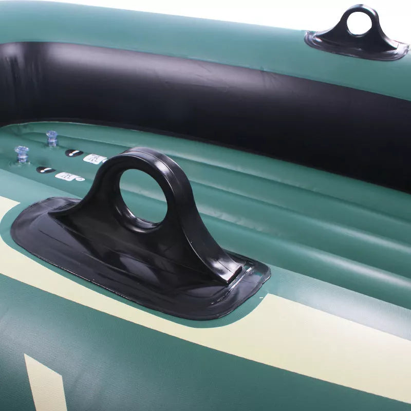 Small green PVC inflatable boat for fishing and rafting, durable and lightweight