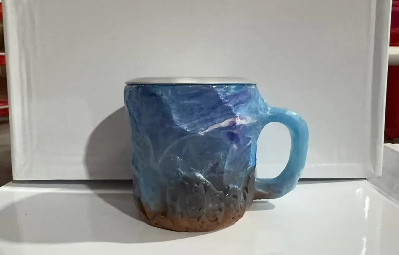 400ml resin mineral crystal coffee mug with handle in assorted colours including purple, blue, and pink.