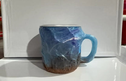 400ml resin mineral crystal coffee mug with handle in assorted colours including purple, blue, and pink.