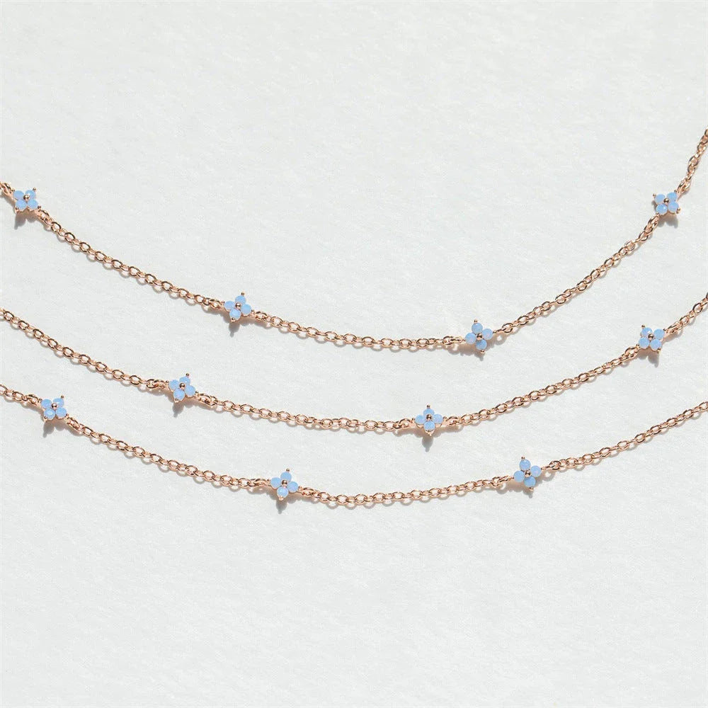 Stylish and versatile blue flower necklace with adjustable chain and vibrant floral accents, perfect for vacations, beaches, and everyday wear.