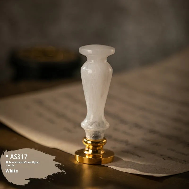 Wooden wax seal handle tool in various designs including lily, pearl cloud, and double dragon styles.