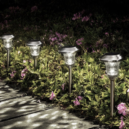 Solar outdoor lawn light in garden setting showing 12×12×42.5cm dimensions and solar panel