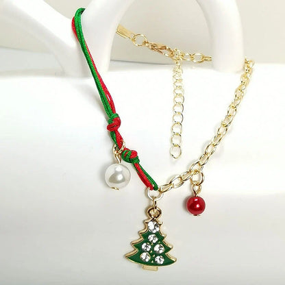 Charming Christmas bracelet with festive charms like Santa, snowmen, and snowflakes