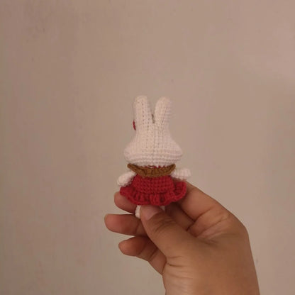 Hand-crocheted wool yarn rabbit keychain pendant with decorative design