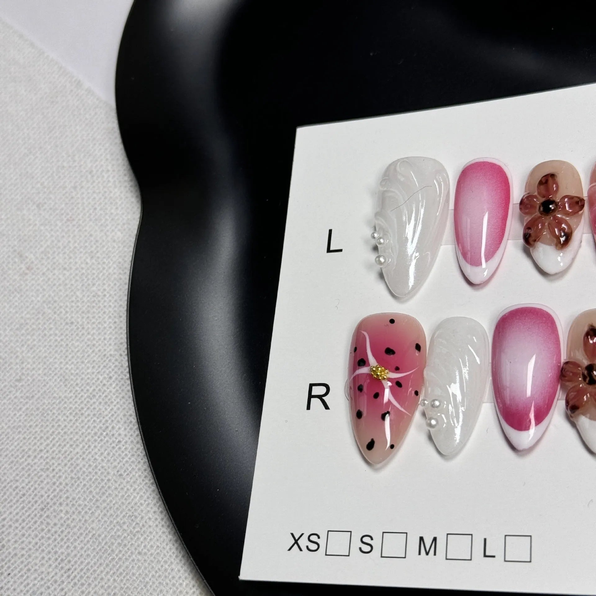 Hand-painted 3D embossed nail art patches in almond shape, showing candy and textured patterns.