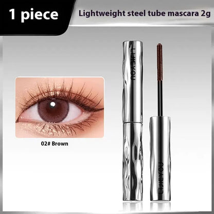 Waterproof mascara in steel tube with optional eyelash curler in black and brown colours