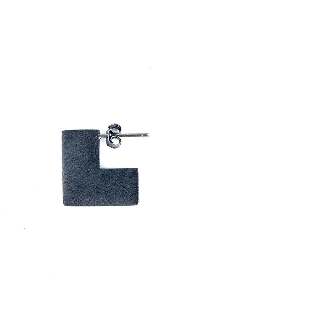 Oxidised black sterling silver earrings with a geometric square shape and minimalist ring design.