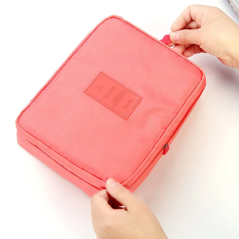 Stylish portable makeup bag with waterproof divider, multi-compartment storage, and variety of color options