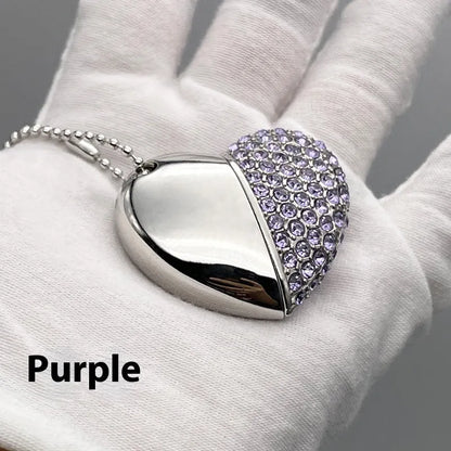 Heart-shaped metal USB flash drive with a brick-patterned surface in multiple colour options.